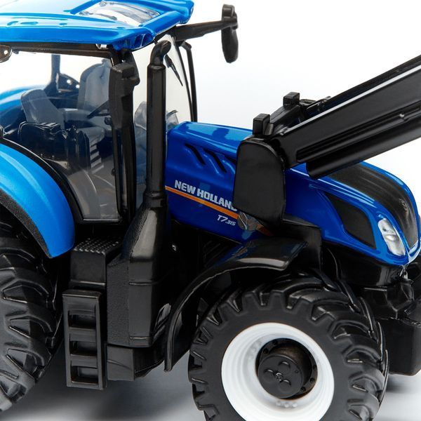 Модель серії Farm - ТРАКТОР NEW HOLLAND T7.315 з фронтальним навантажувачем (синій, 1:32) 18-31632 фото